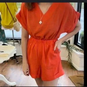 Thml orange short romper size medium